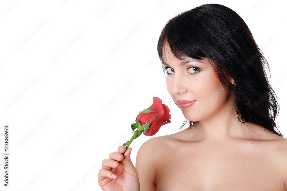Young lovely brunette with a beautiful red rose Young lovely brunette with a beautiful red rose