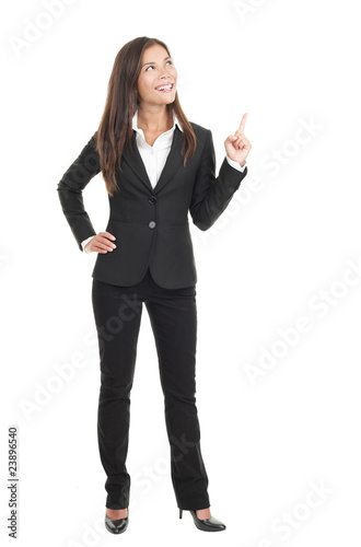 Businesswoman pointing on white background