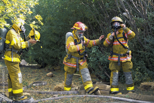 Firemen Putting On Equipment photo