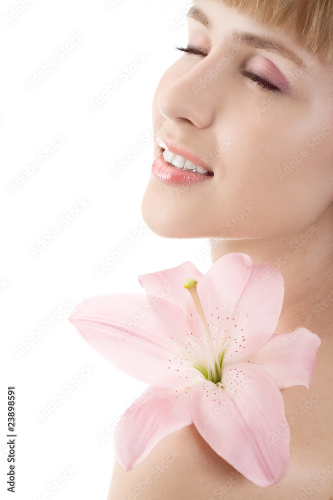 Beautiful woman with pink lily isolated on white Beautiful woman with pink lily isolated on white