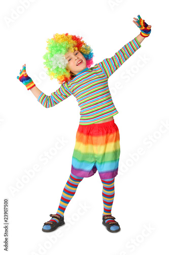 little boy in clown dress standing isolated on white background