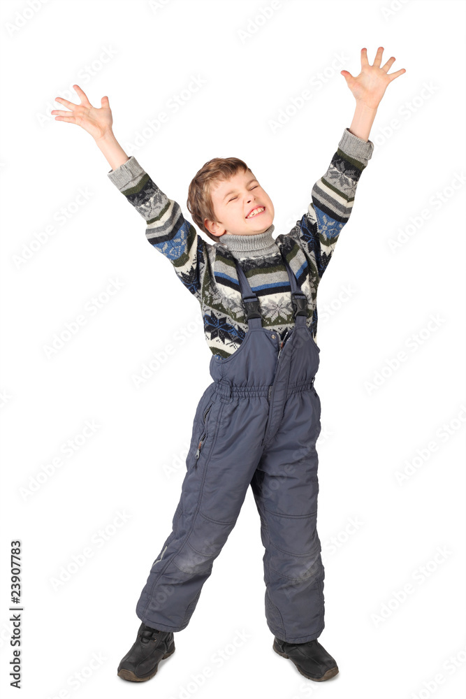 boy in one-piece suit smile and put his hand up isolated boy in one-piece suit smile and put his hand up isolated