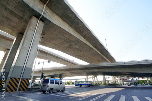 Modern urban transport, car driving under the overpass.