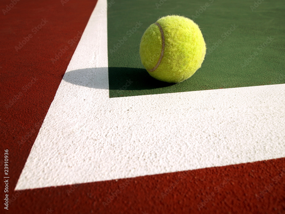 Tennis ball and tennis court