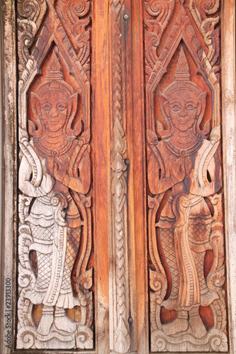 art on door of temple, Wat Nong Sim Noi, Borabue