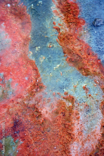 Red sediments in hot spring background © Alexander Zotov
