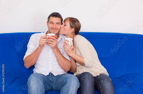 couch cup drinking couple photo