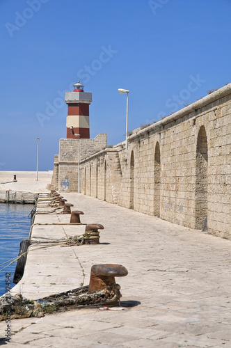 Monopoli tourist port with lighthouse. Apulia.