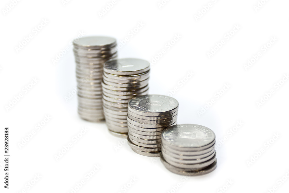 rising stack of coins with focus on the second stack rising stack of coins with focus on the second stack