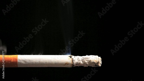 Time lapse of cigarette burning and smoking photo