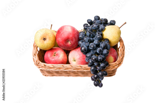 Tasty,juicy fruit in the wooden basket.