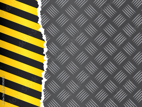 Metal floor tile with hazard tape