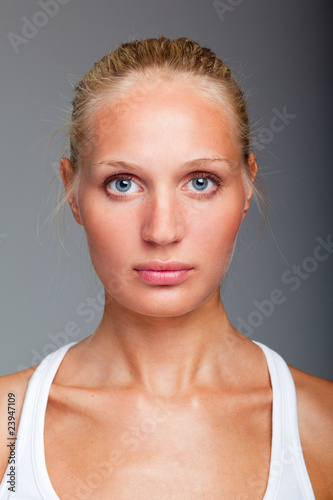 Portrait of cute young woman face