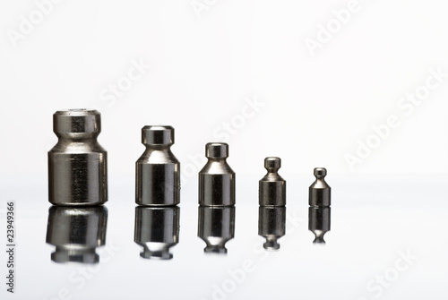 Set of weights with reflection on white
