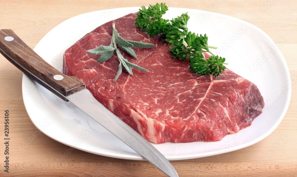 steak on white plate