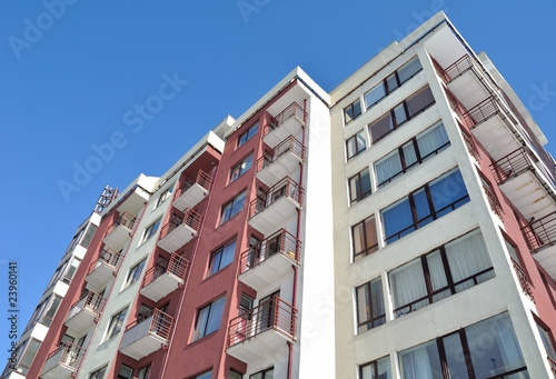 Facade modern multistorey apartment house. Block of flats.