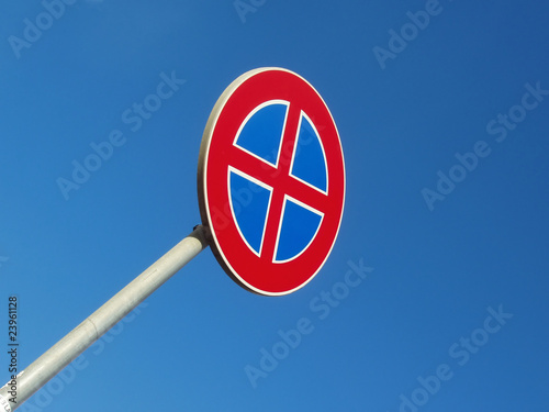 Restriction sign. Parking and stopping is not allowed.