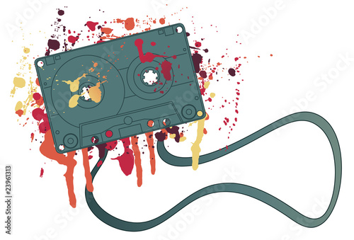 Music cassette tape with jumbled mess of paint splatters