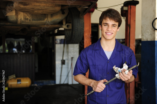 car mechanic at work with copy space