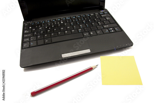 laptop, pencil and paper note photo
