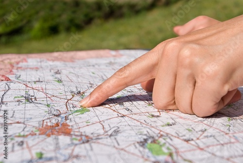 woman finger on a map