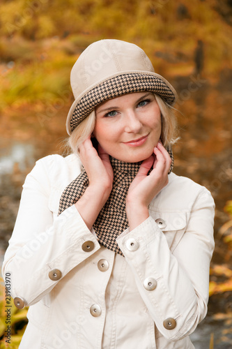 young pretty woman in autumn forest