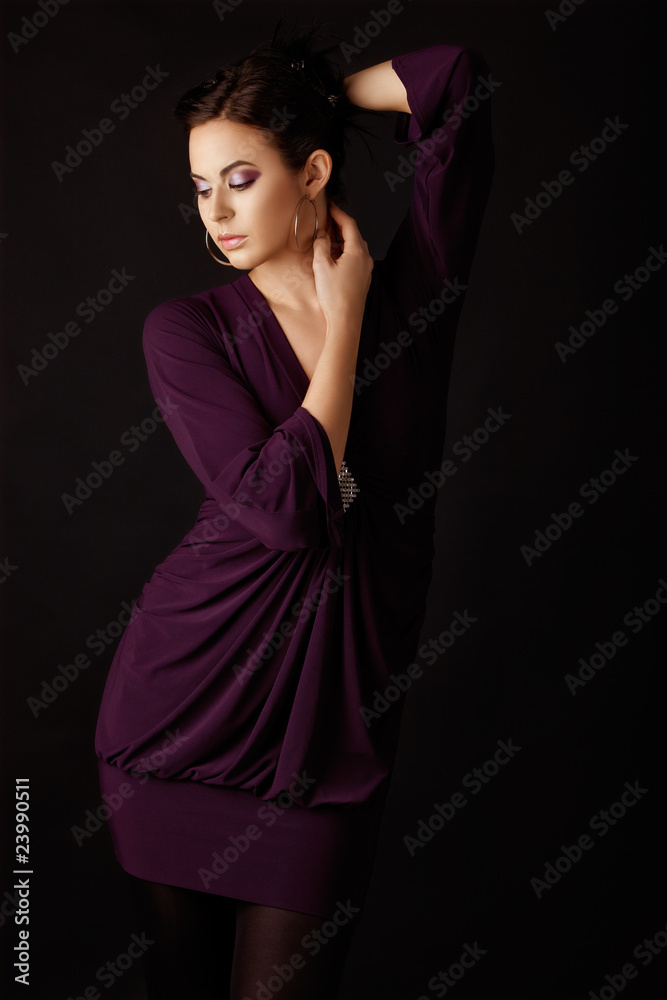 Obraz premium Fashion model in purple mini dress