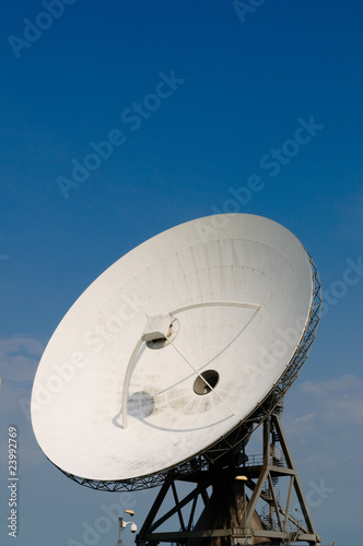 satellite communication disc against blue sky