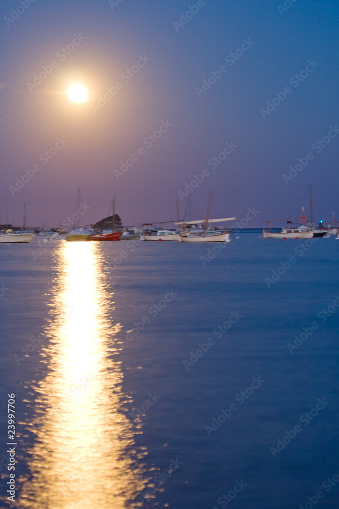 Moon rising in the Mediterranean sea over Cadaques