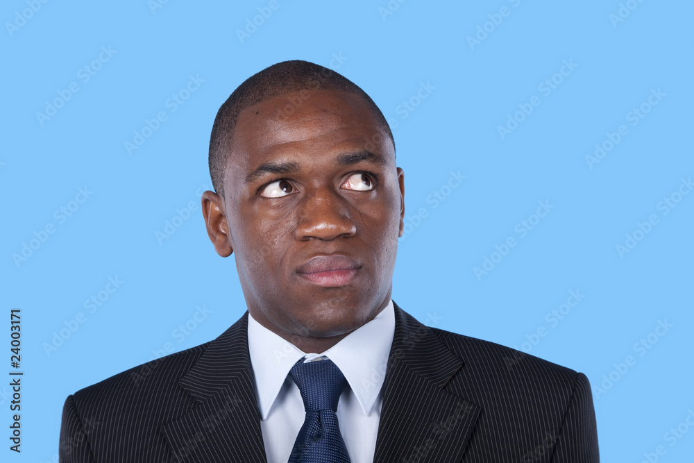 African businessman looking up African businessman looking up