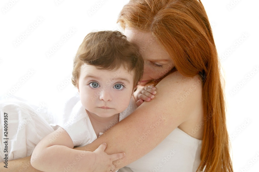 baby and redhead mother hug on white baby and redhead mother hug on white