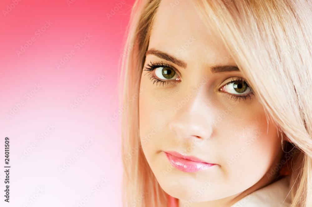 Fototapeta premium Blond girl against colourful background