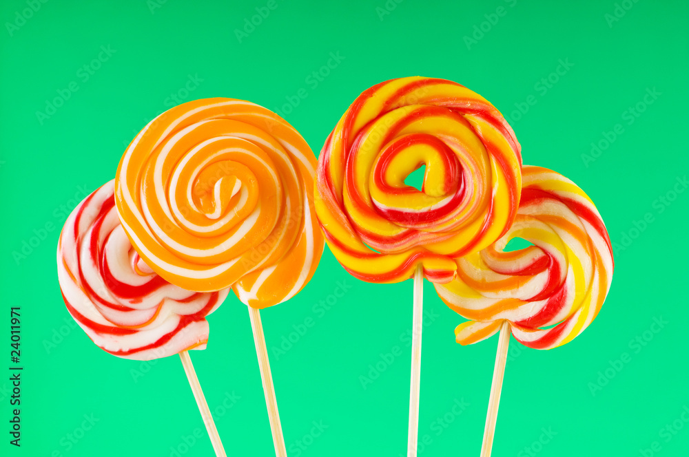 Colourful lollipop against the colourful background Colourful lollipop against the colourful background