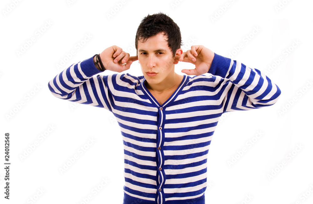 Young man with fingers in ears isolated on white Young man with fingers in ears isolated on white