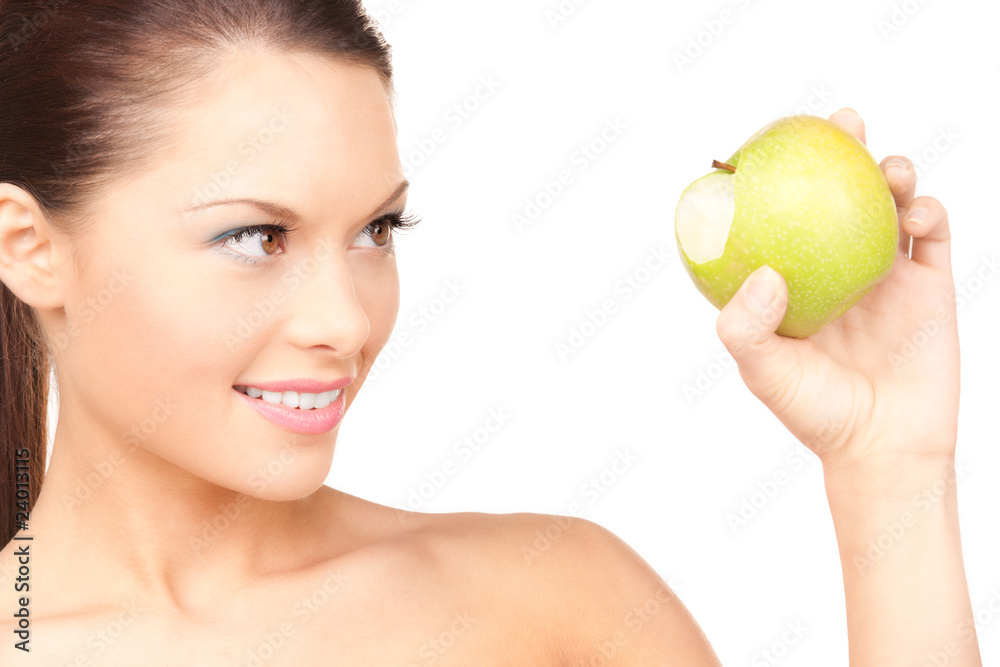 young beautiful woman with green apple young beautiful woman with green apple