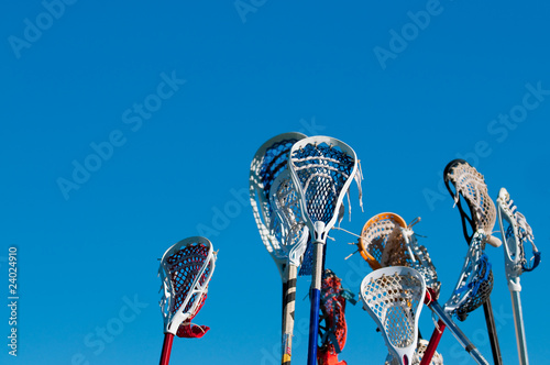 Fotografia Many lacrosse sticks in the air