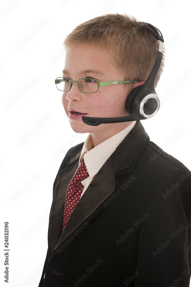 A small boy pretending to be a businessman.