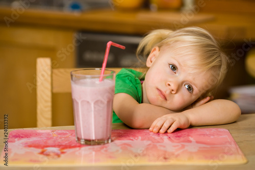 little girl with smoothie