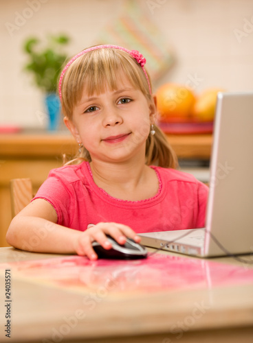 Obraz w ramie girl working on computer