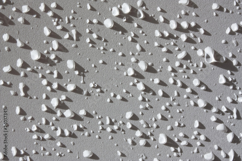 White wall spattered with drops
