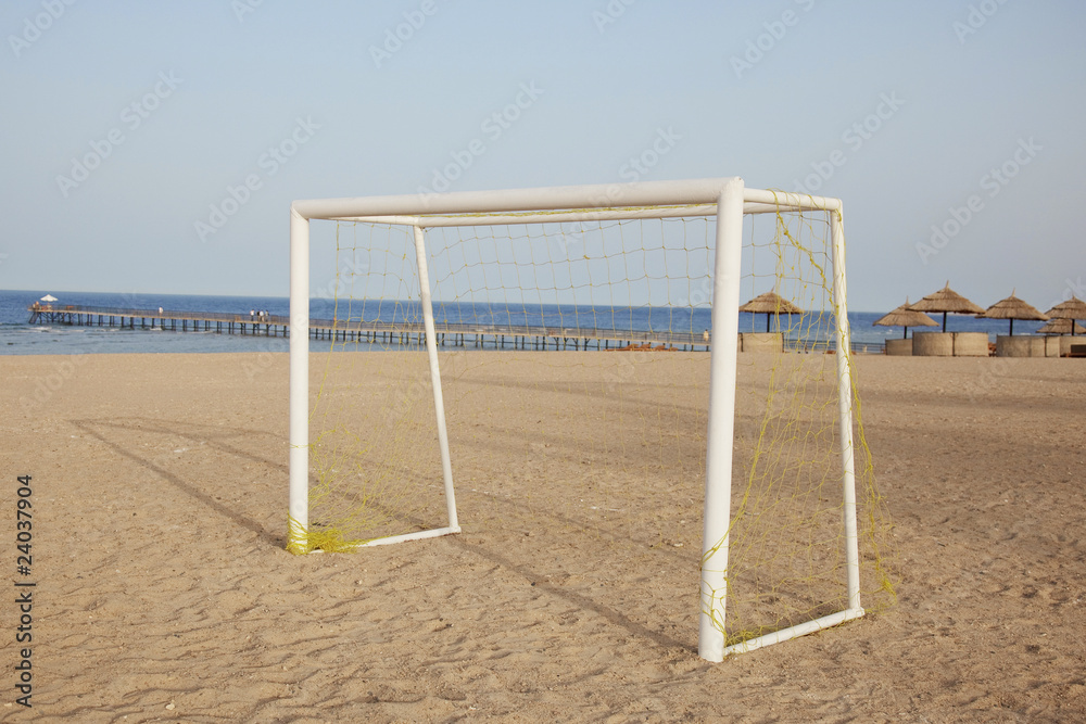 Footballs gates on a beach.