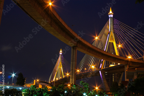 Night sceen of king rama eight 's skyline bridge in Thailand photo
