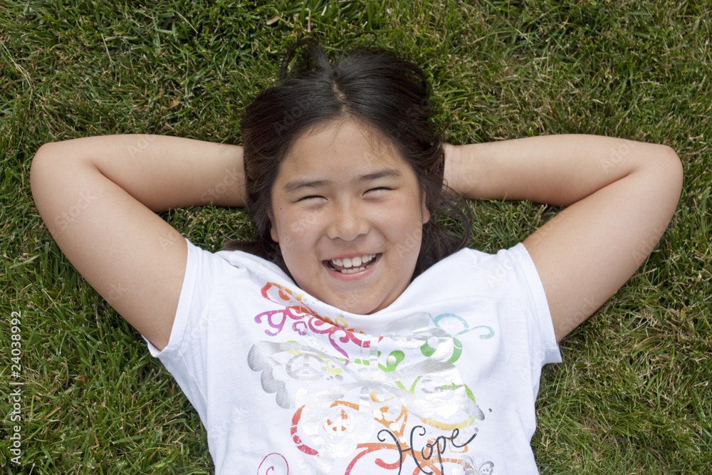 Girl Relaxing in the Grass Girl Relaxing in the Grass