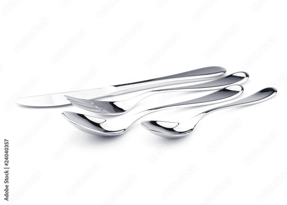 Silverware set - fork, knife, and two spoons Silverware set - fork, knife, and two spoons