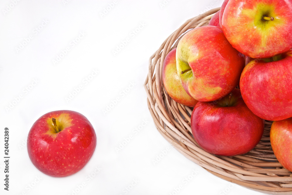 apples in basket isolated on white background apples in basket isolated on white background