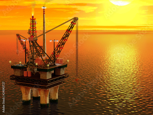 Piattaforma petrolifera al tramonto photo