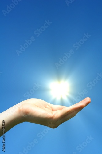 hand sun and blue sky