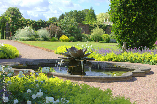 Waterlily fountain in an English garden photo