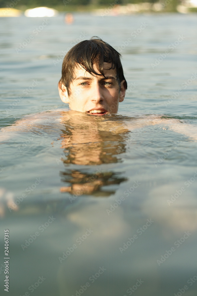 boy in water swiming