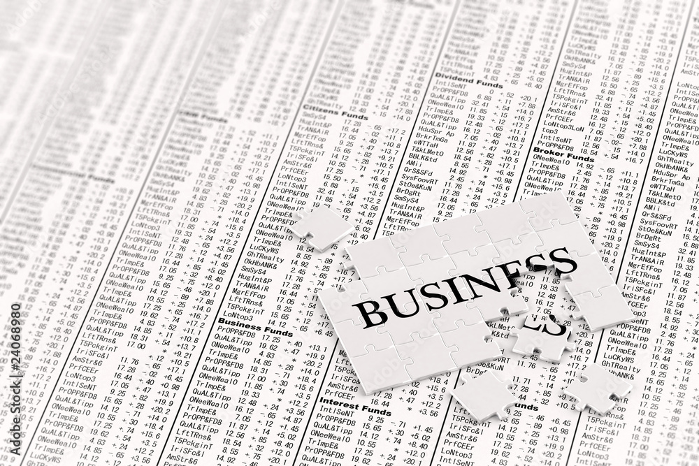 Fototapeta premium Unfinished business puzzle on stock charts
